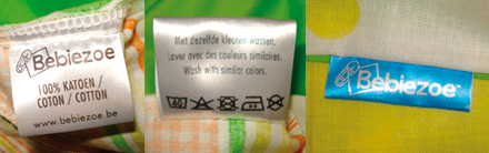 Labels voor het stikken op textiel met wasvoorschiften (satijn)